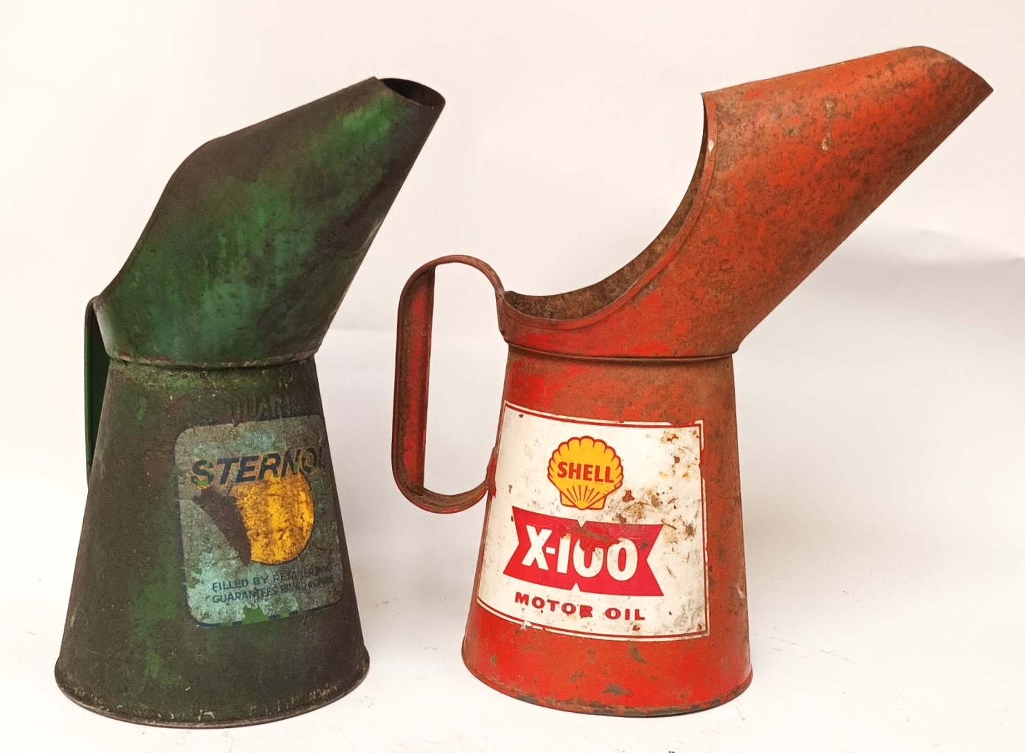 A Shell X100 quart oil jug and a Sternol jug (2)