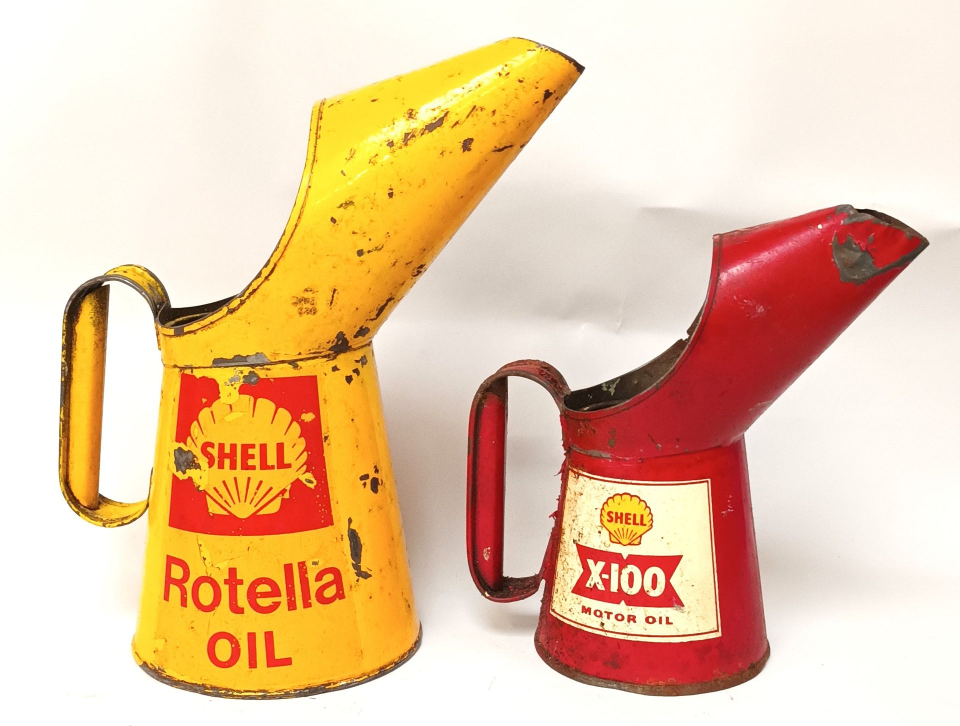 A Shell Rotella quart oil jug and a Shell X100 pint jug (2)