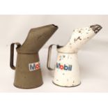 Two Mobil quart oil jugs