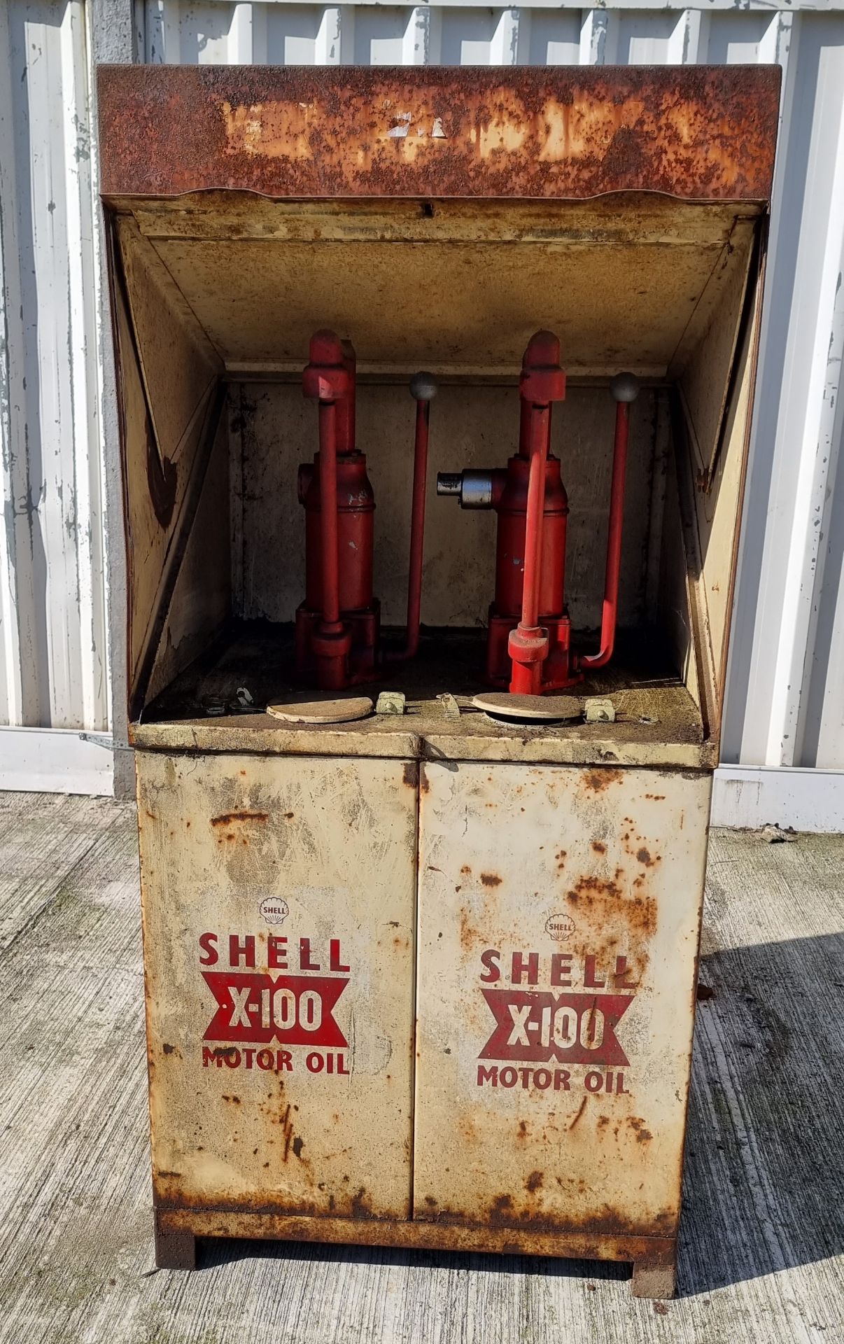 A Shell X100 forecourt oil dispenser, 140 x 62 x 67cm