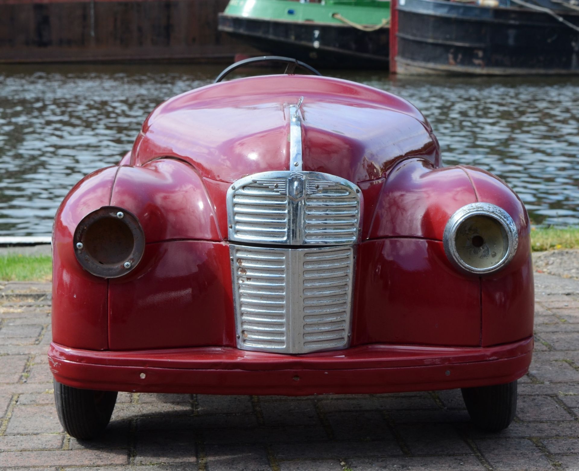 An Austin J40 pedal car, c.1948, offered in red, partially restored. The car was made from heavy- - Image 3 of 7