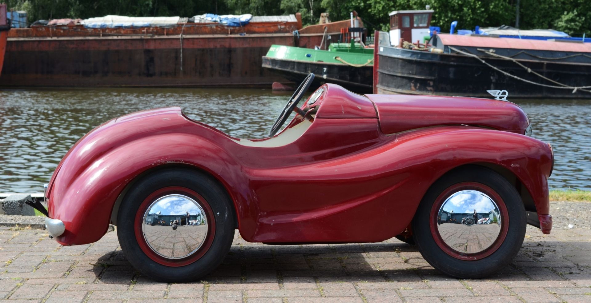 An Austin J40 pedal car, c.1948, offered in red, partially restored. The car was made from heavy- - Image 2 of 7