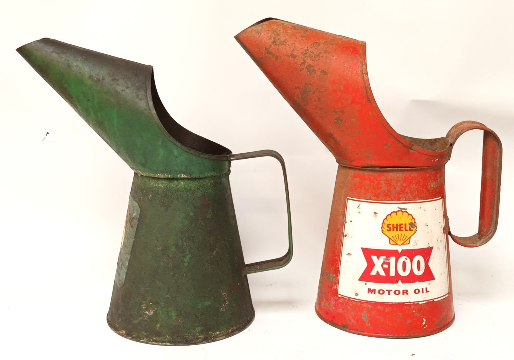 A Shell X100 quart oil jug and a Sternol jug (2) - Image 2 of 2