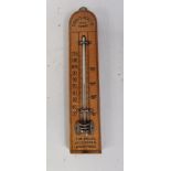 A Curry's Cycle Co. wooden thermometer, 20cm