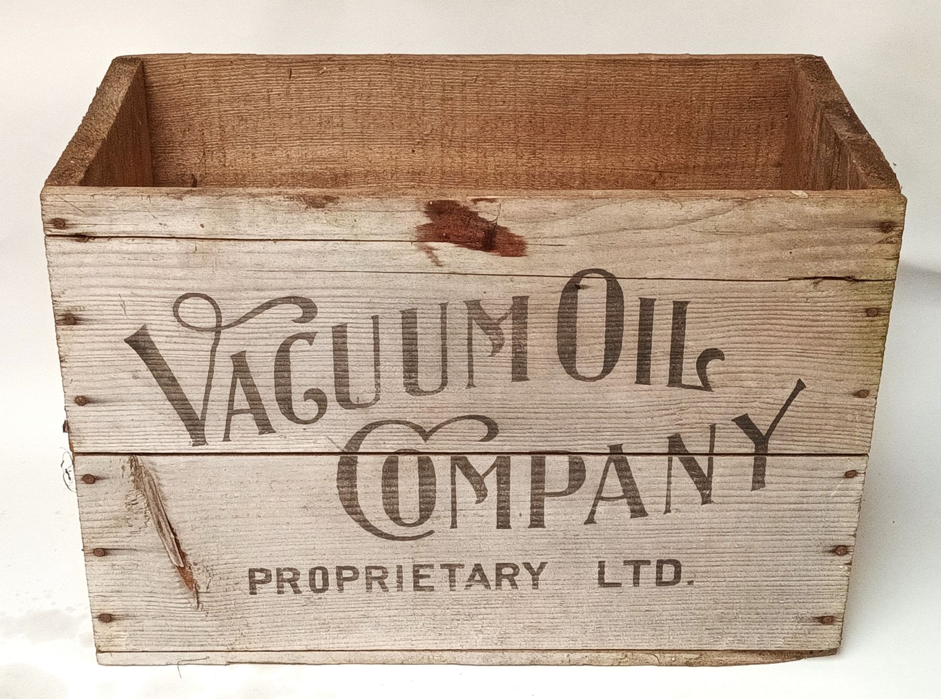 A New Zealand Vacuum Oil Company/Plume Motor Spirit wooden crate, 53 x 26 x 37cm