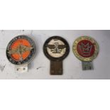 An Austin Ex Apprentices Assoc, badge and two other badges