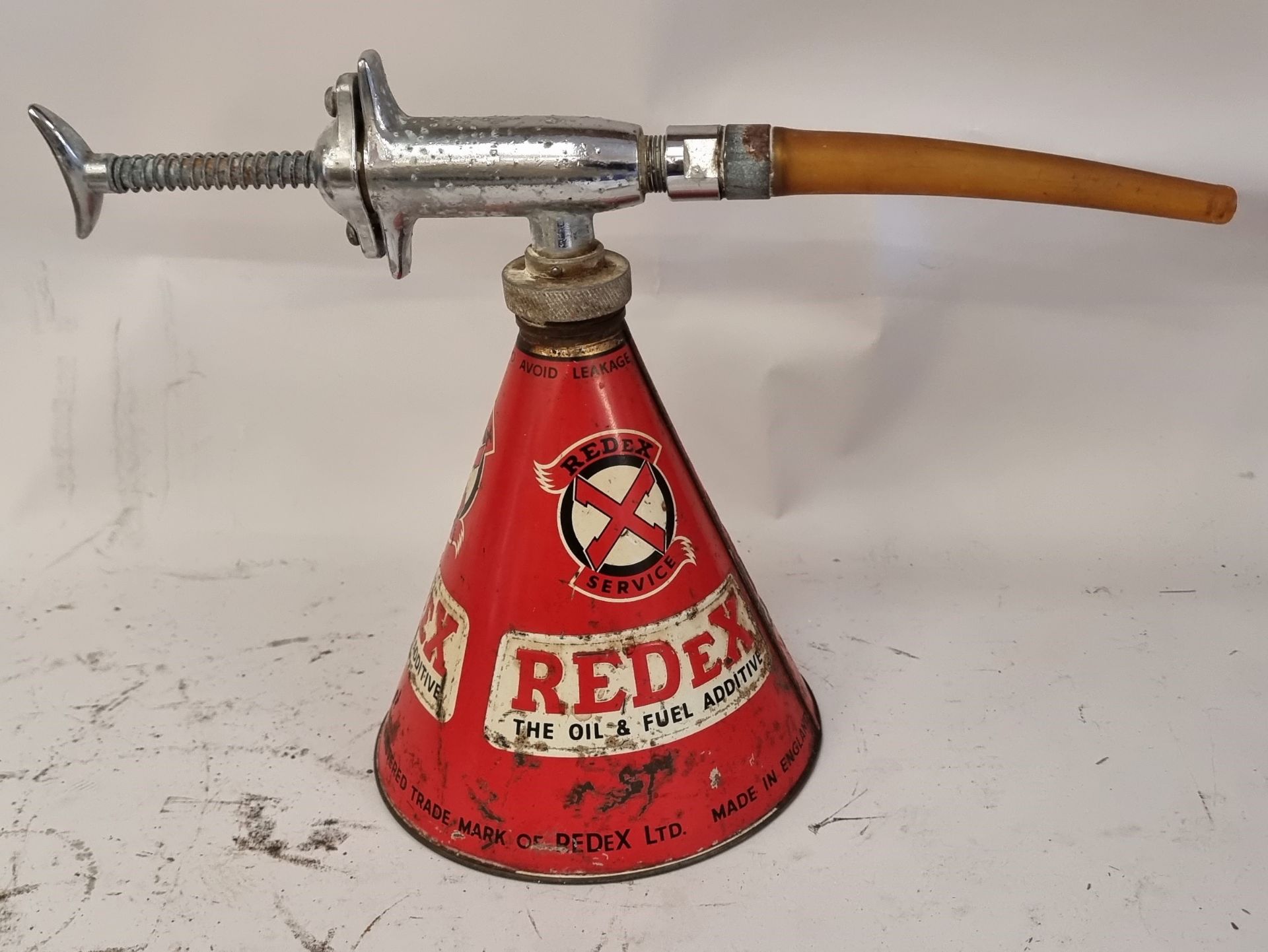 A Redex oil shot dispenser