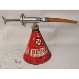 A Redex oil shot dispenser