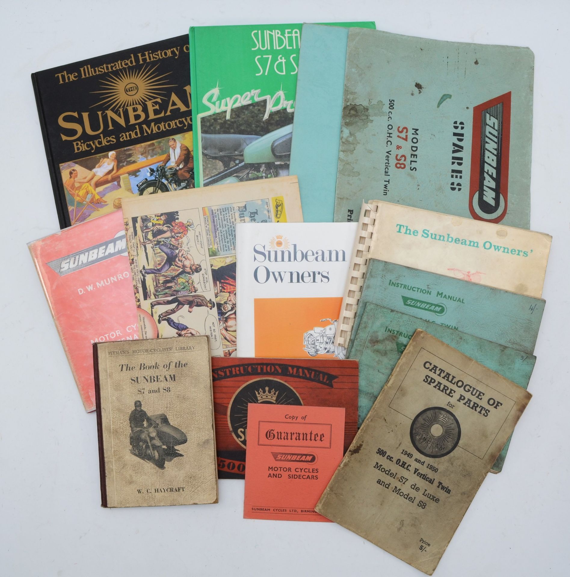 A collection of Sunbeam S7/8 books, including a rare 10th September 1954 Eagle comic advert,