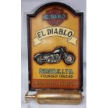 An El Diablo painted wooden motorcycle sign, 59 x 37cm, together with a brass Auto MiniMax Hand Pump