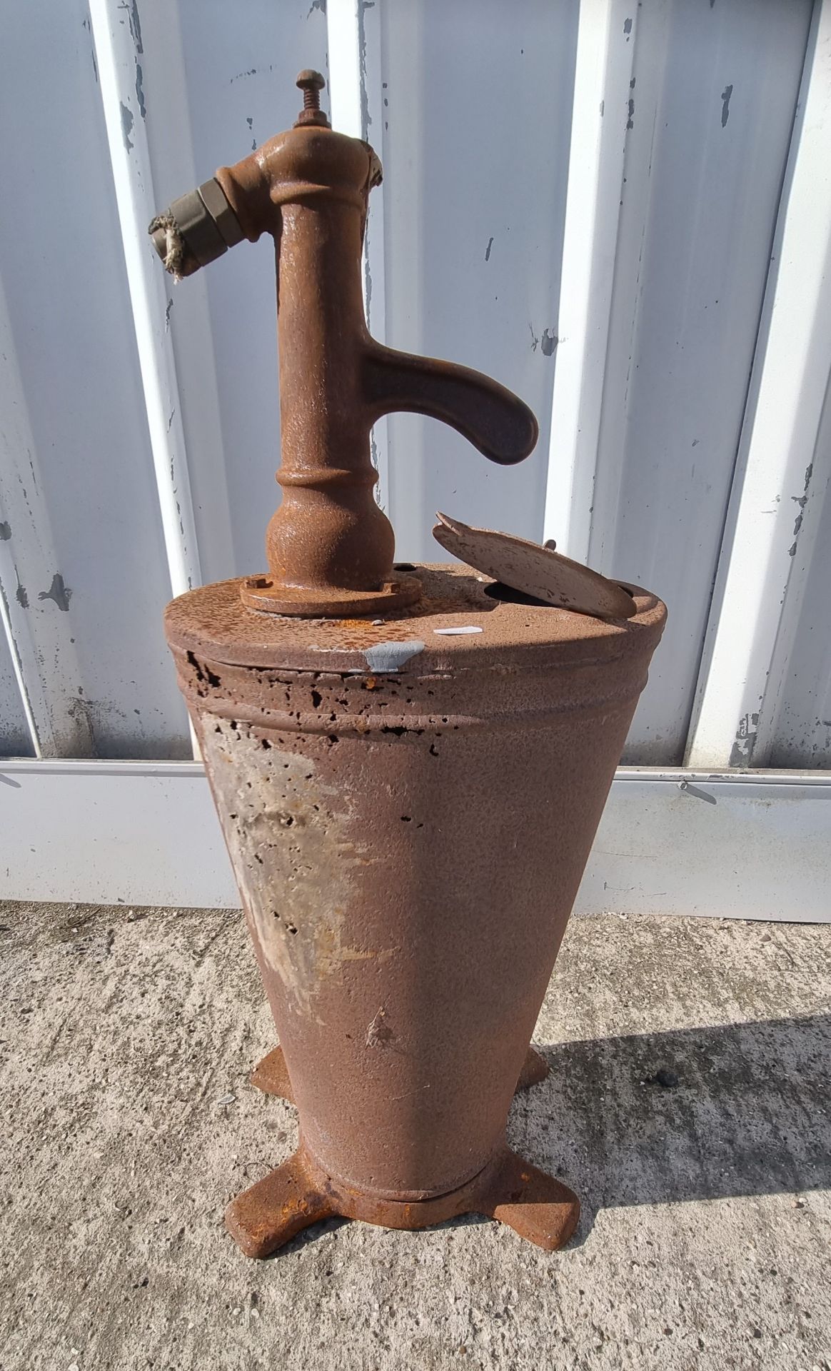 An unbranded forecourt oil dispenser