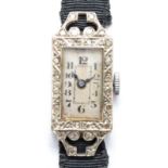 An Art Deco white metal and diamond set ladies wristwatch, probably platinum, 6.3gm without the