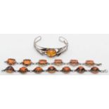 Two silver and amber bracelets and a bangle, 54gm