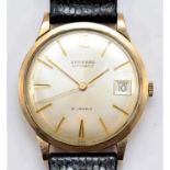 Garrard, a 9ct gold presentation date gentleman's manual wind wristwatch, engraved D.N. HALL,