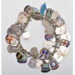 A vintage silver and enamel town crest charm bracelet, 81gm