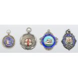 Four silver and enamel fobs, Yarmouth & Gorleston Wheeler, Enfield Athletic Club, Yorkshire