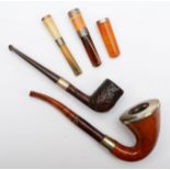 A silver mounted meerschaum pipe, Chester 1912, a Dunhill briar and silver mounted pipe and three