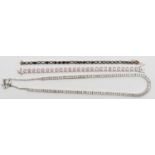 Two silver and gemstone set line bracelets and a silver line necklace, 72gm