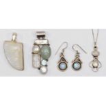 Two silver and moonstone pendants, a pendant and a pair of ear rings, 50gm