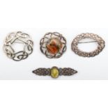Four Celtic design silver brooches, 30gm