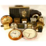 A collection of mantel clocks, carriage clocks, anniversary clocks and barometers, having manual