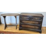 A oak chest of drawers, two small drawers over two graduated drawers, lockable, with brass drop hand