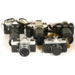 Five 35mm film cameras, to include a Praktica MTL 5 B, a Nikon F-301, a Fujica ST605, a Zenit-E