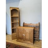 A pine unit, hinged doors open to revel a shelved interior, 92 x 76 x 37cm, together with a pine