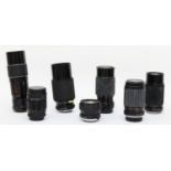 Seven camera lenses, to include a Optomax 135mm f2.8, a Hanimex 80mm-200mm f4, a Clubman 80mm-