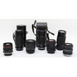 Seven camera lenses, to include a Tokina 28mm-70mm f3.5-f4.5, a Sigma 70mm-210mm f4-f5.6, a