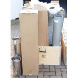 A large collection of various sized galvanised & stainless steel flue pipes.