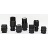 Seven camera lenses, to include a Prinzflex 35mm-70mm f3.5-f4.5, a Photax 80mm-205mm f4.5, a