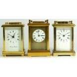 Three brass 8 day carriage clocks, having enamelled dials with Roman numerals, unnamed movements. (