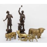Two spelter bronzed figures of blacksmiths, on circular wood bases, 46cm tall, together with four