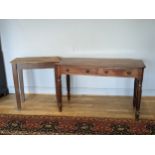 A hall table, with two drawers, bun handles, on turned legs, 122 x 76 x 53cm, together with a