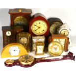 A collection of early 20th century and later mantel clocks, having quartz and manual wind movements,