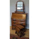 A early 20th century walnut bureau, desk over three graduated drawers, 84 x 101 x 40cm, together wi