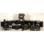 Ten film cameras, to include a Polaroid Supercolor 635CL, a Coromet Twelve 20, a Nettar 51, a Nettar