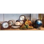 A collection of miscellaneous, to include mantel clocks, a copper coal scuttle, a globe,