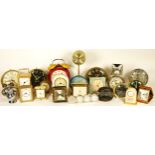 A collection of mid 20th century and later traveling alarm clocks, bedside alarm clocks and