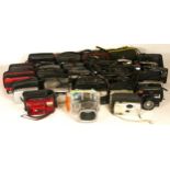 A collection of twenty four compact film cameras, to include a Agfa Optima, a Halina 270DX, a