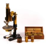 A W. Watsons & Sons Ltd microscope, with brass arm and coarse focus, together with two brass twist