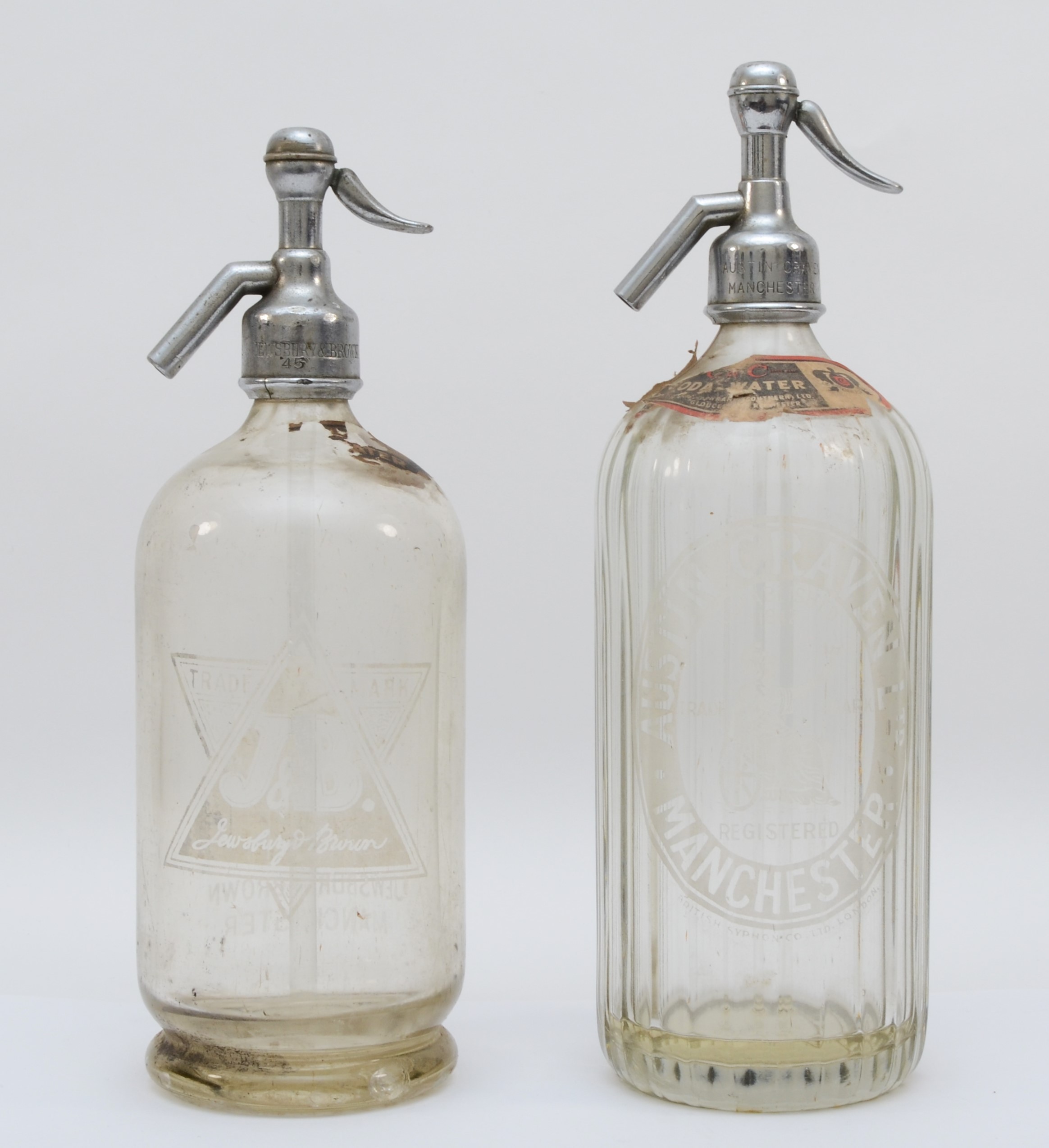 Two soda syphons, to include J & B Jewsbury & Brown of Manchester and Austin Craven Ltd of