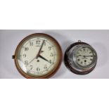 A brass 7 1/2" dial bulkhead clock and a Sestral chrome 4" dial bulkhead clock (2)