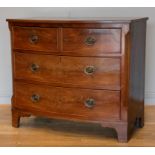 A late 19th century bow fronted mahogany chest of drawers, two small lockable drawers over two