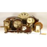 A collection of clocks, to include a Schatz mechanical carriage clock, a Kundo anniversary clock and