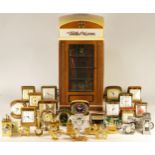 A collection of mechanical and quartz clocks, to include alarm, miniature, novelty, figural, mantel,