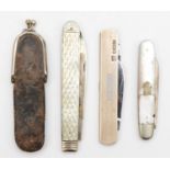 A Georgian silver and mother of pearl fruit knife, Sheffield 1815, another Sheffield 1911 and a