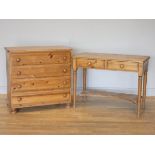 A stained pine (possibly Ducal) chest of drawers, four drawers with bun handles, on bun feet, 88 x