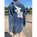 Ladies 1980s vintage fashion, stonewashed long denim jacket with leather, applique and rhinestone